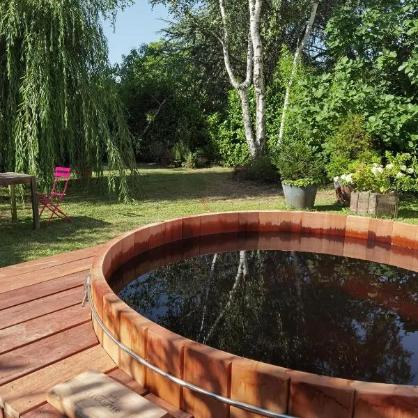 Vue de l’établissement 2 chambres avec jardin et jacuzzi dans une maison familiale