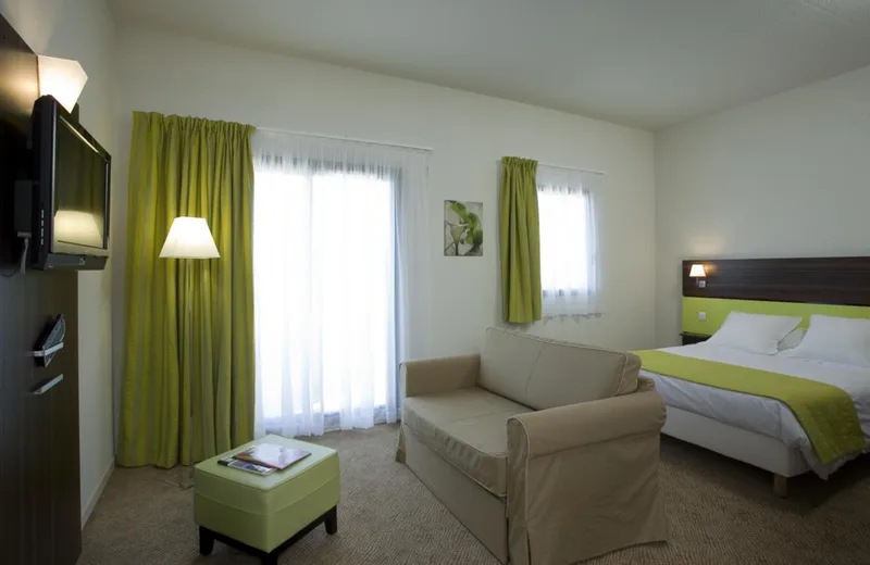 Chambre du Palladior Voiron aux tons verts