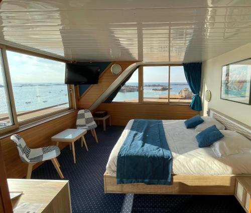 Chambre de l’établissement Hotel De La Mer